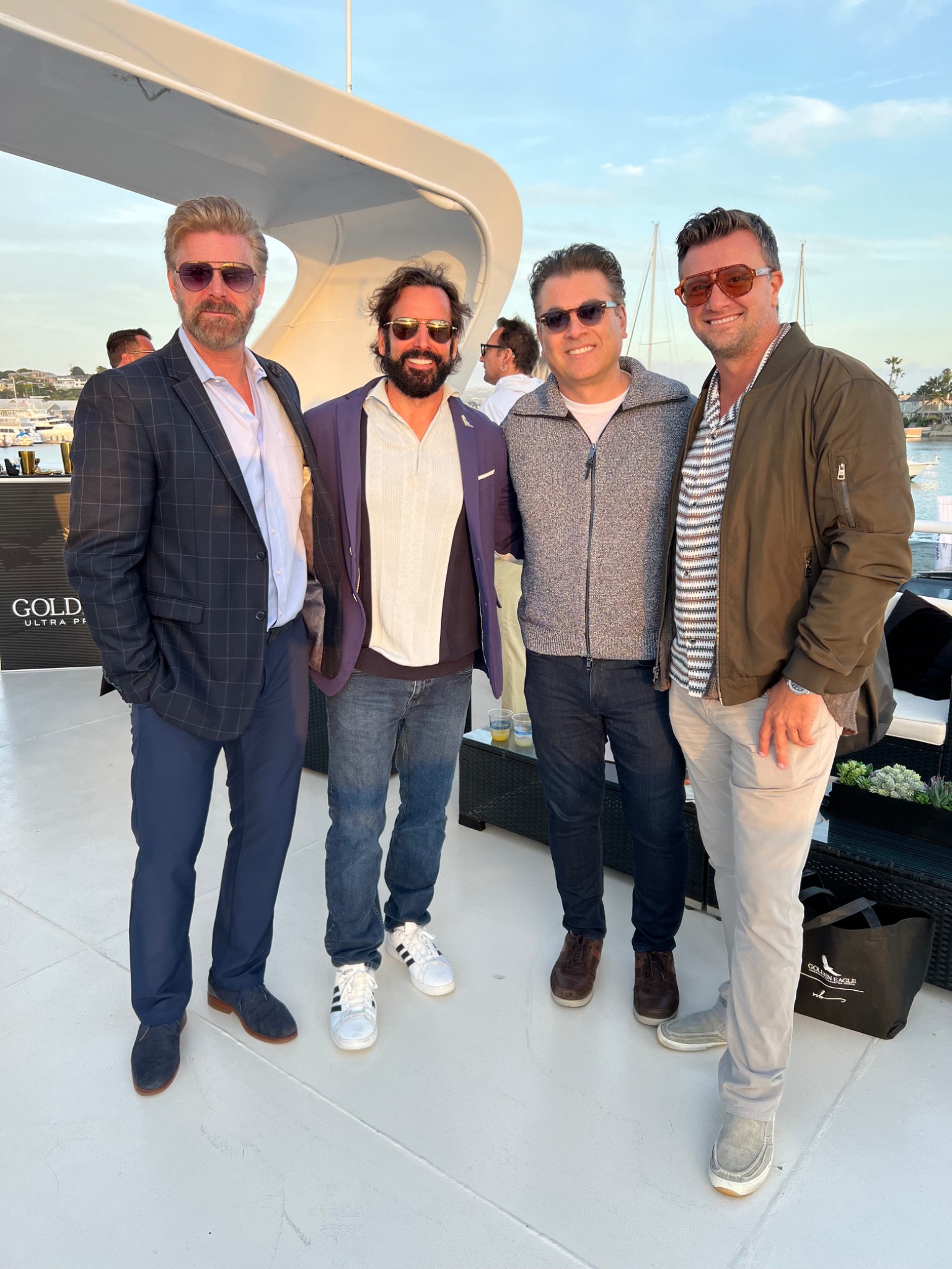 Kent Speakman with friends aboard a boat