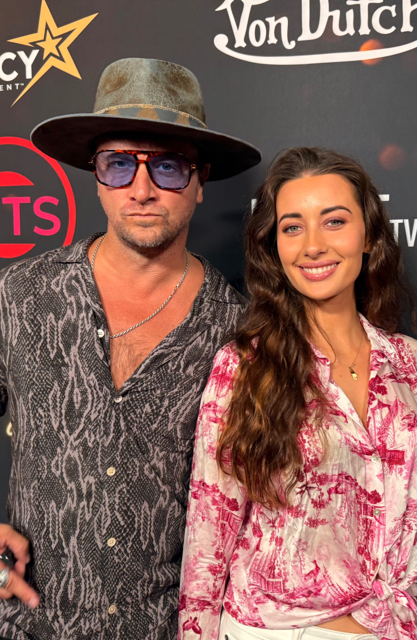 Kent Speakman with a guest at a fashion and entertainment event